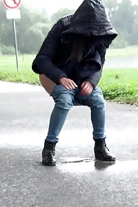 Impressive Black Haired Girl Pees On The Ground