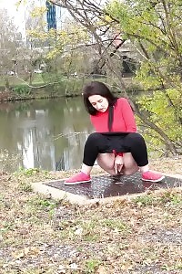 Black Haired European Pisses Outside By Watershed