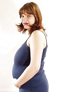 Awesome Pregnant Having Fun With Her Eating Tits And Good Rounded Stomach Before Stretching Her Gap