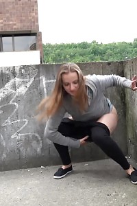 Magnificent Brunette Pisses In The Middle Of The City