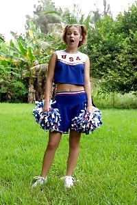 Take A Look At This Kinky Cheerleader As She Undressed And Jerking Off Her Gap In The Public