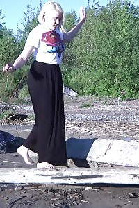 Stunning Blonde Squatting To Piss In The Countryside